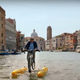 Or “riding whatever this is down a canal” music (Photo: Amazon Studios)